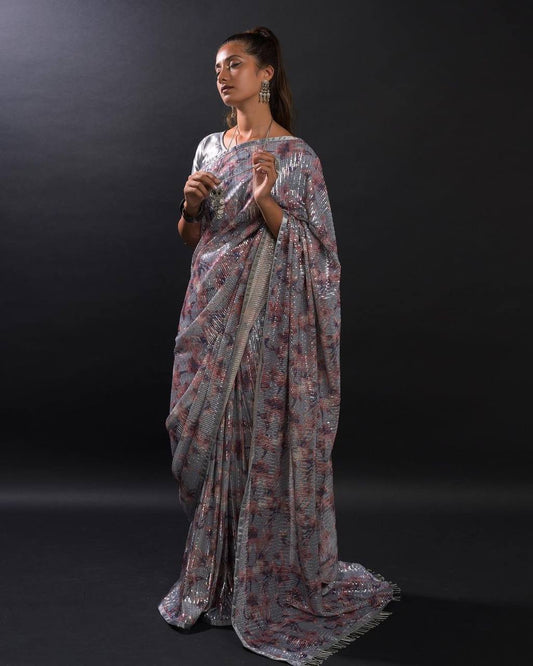 Embrace the Enigmatic Beauty of the Evening with this Exquisite Sequined Saree Ensemble