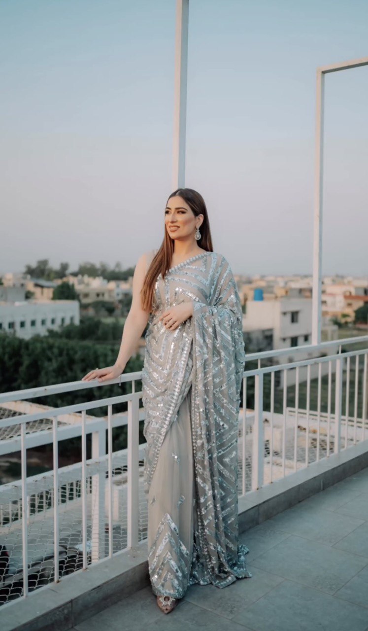 Enchanting Georgette Saree: A Symphony of Sequins and Elegance